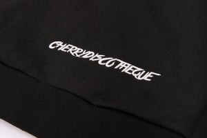 CHERRY DISCOTHEQUE - TOO SAINT SWEATER IN ONYX BLACK