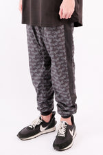 Load image into Gallery viewer, CHERRY DISCOTHEQUE - MULTI LOGO PRINT SWEATPANTS
