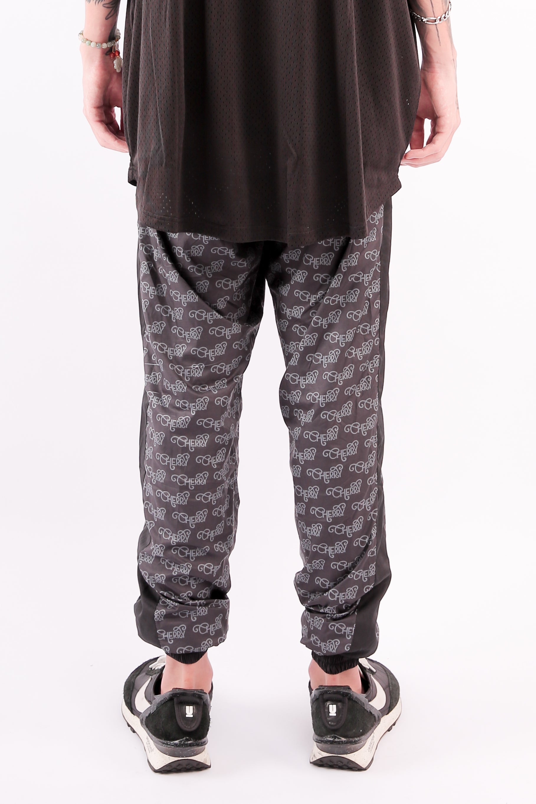 CHERRY DISCOTHEQUE - MULTI LOGO PRINT SWEATPANTS